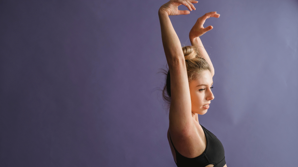 Person doing gentle yoga stretches in a peaceful space