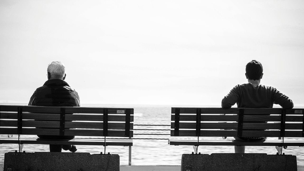 A thoughtful individual journaling mindfully, symbolizing the connection between self-awareness practices and enhanced emotional intelligence, as taught by mental health professionals.