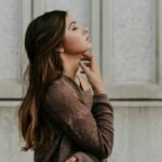 A person quietly meditating, staying relaxed and present in the moment.